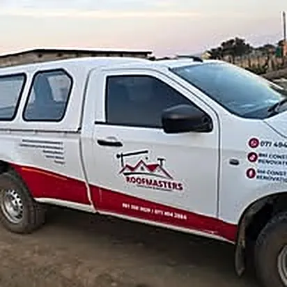 RM Construction branded service vehicle on site